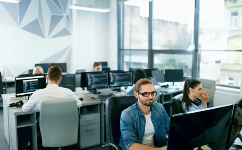 People Working In Modern Office.